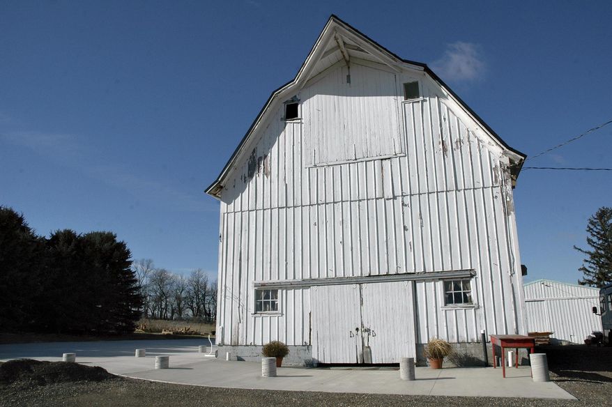 This Feb. 2, 2017 photo shows, Brad and Carla Miller's dairy barn that they transformed along with the surrounding grounds into The Barn on the Hill, for weddings, rehearsals, showers, class reunions, anniversary and birthday parties in Leaf River, Ill. The Barn on the Hill features a large concrete patio around two sides of the barn to give guests flexibility for celebrations inside, outside, or both (Vinde Wells/Sauk Valley Media via AP)