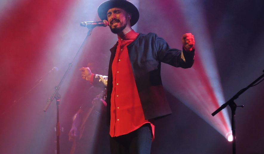In this April 6, 2017 photo, Argentina's Abel Pintos performs during a concert at the Lunario of the National Auditorium in Mexico City. Pinto debuted in Mexican stages with this concert. (AP Photo/Berenice Bautista)
