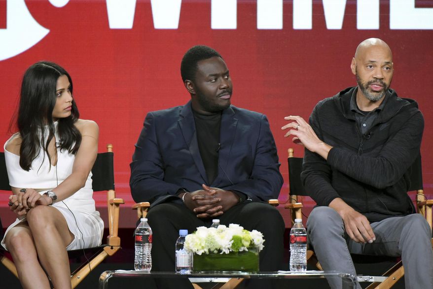 FILE - In this Jan. 9, 2017 file photo, actors Freida Pinto, from left, Babou Ceesay and writer-producer John Ridley participate in the "Guerrilla" panel at the Showtime portion of the 2017 Winter Television Critics Association press tour in Pasadena, Calif. Ridley said he expected his "sharply political" TV miniseries "Guerrilla," about black rights activists in 1970s England, to be provocative. But the criticism he received at a London screening for the series' lack of a major black female character took him by surprise, he said Monday, April 10. (Photo by Richard Shotwell/Invision/AP, File)