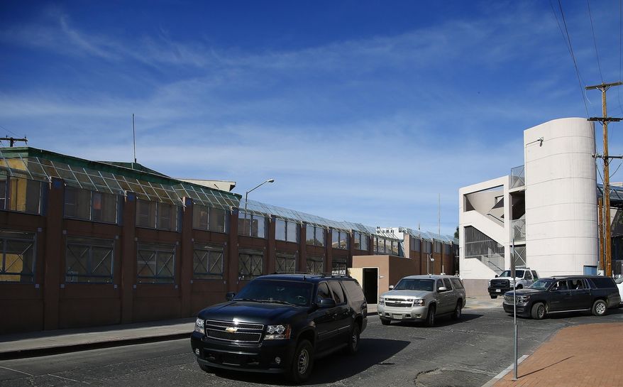 A motorcade with Attorney General Jeff Sessions tours the U.S.-Mexico border with border officials, Tuesday, April 11, 2017, in Nogales, Ariz. Sessions announced making immigration enforcement a key Justice Department priority, saying he will speed up deportations of immigrants in the country illegally who were convicted of federal crimes. (AP Photo/Ross D. Franklin)