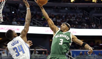 FILE - In this Jan. 20, 2017, file photo, Orlando Magic&#39;s Jeff Green (34) blocks a shot by Milwaukee Bucks&#39; Jason Terry (3) during the first half of an NBA basketball game, in Orlando, Fla. Terry&#39;s streak of postseason appearances has reached 12 years. He&#39;s a veteran presence who will come in handy in the postseason for the young Bucks. (AP Photo/John Raoux, File)