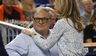 Miami Marlins owner and CEO Jeffrey Loria and his wife Julie Lavin Loria, wait for the start of a baseball game between the Marlins and the Atlanta Braves, Tuesday, April 11, 2017, in Miami. Hours before the Marlins&#39; home opener Tuesday, Marlins president David Samson said talks with multiple parties interested in buying the team are in the &amp;quot;fourth inning,&amp;quot; leaving lots of uncertainty about the future of the franchise. (AP Photo/Wilfredo Lee)