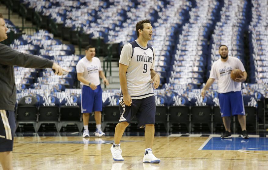 Former Dallas Cowboys quarterback Tony Romo walks the floor after a Dallas Mavericks morning NBA basketball shoot around in Dallas, Tuesday, April 11, 2017. Romo will be a Maverick for day and ride the bench when the team plays the Denver Nuggets in a home finale featuring two teams that failed to make the playoffs this year. (AP Photo/LM Otero)