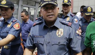 Philippine National Police Chief Ronald dela Rosa walks after an anti-terror simulation exercise at a bus terminal in Quezon city, north of Manila, Philippines on Tuesday, April 11, 2017. Dela Rosa said at least several people have been killed in battle between government forces and suspected Abu Sayyaf militants on a central resort island, far from the extremists&#39; southern jungle bases and in a region where the U.S. government has warned the gunmen may be conducting kidnappings. (AP Photo/Aaron Favila)