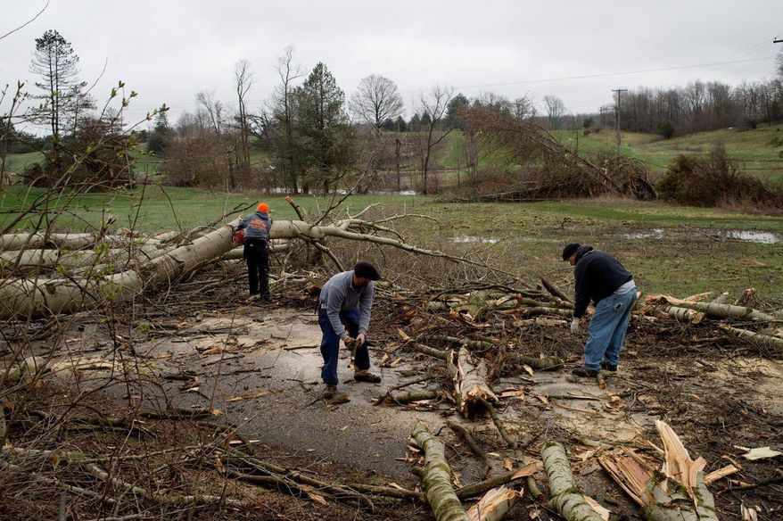 Severe weather damage off of 92nd Street between Wingeier Avenue and Hastings Road in Alto, Mich., on Tuesday, April 11, 2017. Authorities say severe thunderstorms Monday night spawned a suspected tornado in western Michigan, knocking down a barn and blocking roadways with debris. (Neil Blake/The Grand Rapids Press via AP)