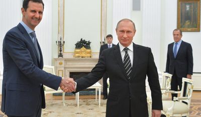 FILE - In this Tuesday, Oct. 20, 2015 file photo, Russian President Vladimir Putin, center, shakes hand with Syrian President Bashar Assad as Russian Foreign Minister Sergey Lavrov, right, looks on in the Kremlin in Moscow, Russia. U.S. Secretary of State Rex Tillerson’s statement Tuesday, April 11, 2017, that the reign of President Bashar Assad’s family “is coming to an end” suggests Washington is taking a much more aggressive approach about the Syrian leader. Taking him out of the equation without a clear transition plan would be a major gamble. (Alexei Druzhinin, Sputnik, Kremlin Pool Photo via AP, File)