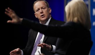 White House press secretary Sean Spicer speaks to moderator Greta Van Susteren at the Newseum in Washington, Wednesday, April 12, 2017, during &quot;The President and the Press: The First Amendment in the First 100 Days&quot; forum. (AP Photo/Carolyn Kaster)