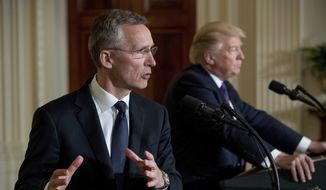 NATO Secretary General Jens Stoltenberg accompanied by President Donald Trump, right, speaks at a news conference in the East Room at the White House in Washington, Wednesday, April 12, 2017, in Washington. (AP Photo/Andrew Harnik)
