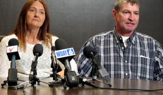 FILE - In this April 15, 2016, file photo, Tammy and John Sadek, parents of Andrew Sadek, a North Dakota college student who was a confidential informant for a drug task force before he turned up dead, talk about the case at a news conference in Fargo, N.D. Almost three years after Andrew&#39;s death, the North Dakota Legislature is putting the final touches on a bill aimed at better protecting confidential drug informants. The bill called &amp;quot;Andrew&#39;s Law&amp;quot; comes after his parents lobbied lawmakers to pass legislation which clarifies the rights of people offered the role. (AP Photo/Dave Kolpack, File)