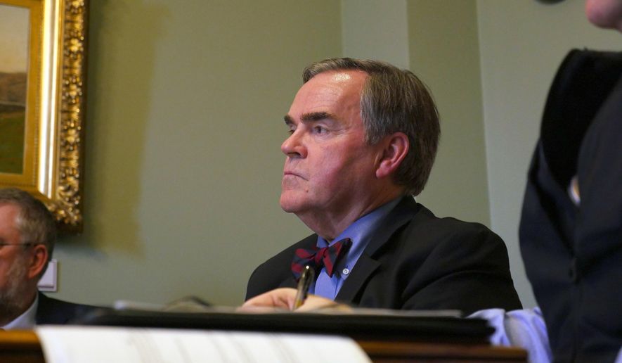 Vermont's Department of Motor Vehicles Commissioner Robert Ide testifies before the state's Senate Government Operations Committee on Tuesday, April 11, 2017, Montpelier, Vt. Newly released emails show DMV investigators were sending personal information on people who they believe fraudulently applied for driver identification cards, often used by people in the country illegally, to Immigrations and Customs Enforcement. (AP Photo/Cory Dawson)