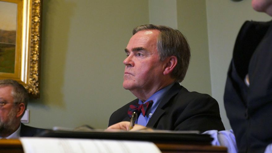 Vermont's Department of Motor Vehicles Commissioner Robert Ide testifies before the state's Senate Government Operations Committee on Tuesday, April 11, 2017, Montpelier, Vt. Newly released emails show DMV investigators were sending personal information on people who they believe fraudulently applied for driver identification cards, often used by people in the country illegally, to Immigrations and Customs Enforcement. (AP Photo/Cory Dawson)