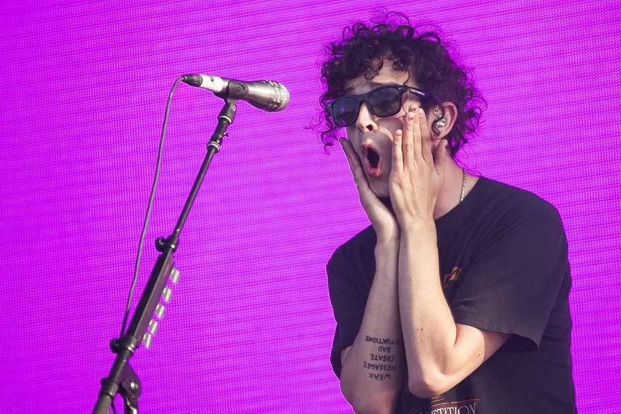 FILE - In this July 8, 2016 file photo, Matthew Healy of The 1975 performs at Wireless Festival in north London. The 1975 is currently on its latest U.S. arena tour, which launched this week. They have been lauded for their distinctive sound, which is a blend of rock, pop, R&B, electronic and other genres. (Photo by Joel Ryan/Invision/AP, File)