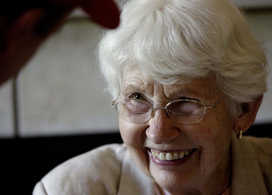 FILE - In this May 16, 2004, file photo, David Letterman's mother, Dorothy Mengering, talks with Timothy Kirby after she autographed a few of her cookbooks he bought at a grill in Muncie, Ind. Mengering was there to promote awareness of iodine deficiency around the world. Mengering died Tuesday, April 11, 2017, Letterman's publicist Tom Keaney confirmed. She was 95. (Kurt Hostetler/The Star Press via AP, File)