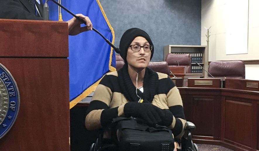 Stephanie Packer, a chronically ill patient, tells reporters she opposes physician-assisted suicide on Wednesday, April 12, 2017, at the Nevada Legislature in Carson City, Nev. She joined doctors and other activists against Senate Bill 261 at a news conference after Democratic lawmakers cancelled a hearing on the proposal that would allow Nevada physicians to prescribe life-ending drugs to patients with prognoses of six months or less to live. (AP Photo/Alison Noon) ** FILE **