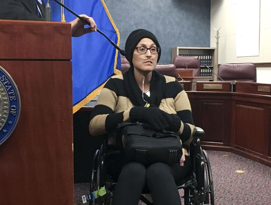 Stephanie Packer, a chronically ill patient, tells reporters she opposes physician-assisted suicide on Wednesday, April 12, 2017, at the Nevada Legislature in Carson City, Nev. She joined doctors and other activists against Senate Bill 261 at a news conference after Democratic lawmakers cancelled a hearing on the proposal that would allow Nevada physicians to prescribe life-ending drugs to patients with prognoses of six months or less to live. (AP Photo/Alison Noon) ** FILE **