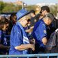 Leicester supporters have their bags searched as they enter the stadium to watch the Champions League quarterfinal first leg soccer match between Atletico Madrid and Leicester City at the Vicente Calderon stadium in Madrid, Wednesday, April 12, 2017. (AP Photo/Francisco Seco)