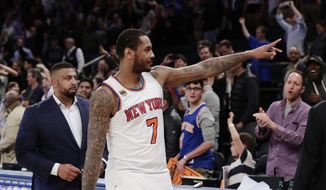 New York Knicks&#39; Carmelo Anthony (7) gestures to fans after an NBA basketball game against the Philadelphia 76ers Wednesday, April 12, 2017, in New York. The Knicks won 114-113. (AP Photo/Frank Franklin II)