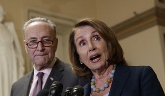 In this March 13, 2017, file photo, House Minority Leader Nancy Pelosi of Calif., accompanied by Senate Minority Leader Charles Schumer of N.Y., speaks to reporters on Capitol Hill in Washington. (AP Photo/J. Scott Applewhite, File)