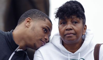 Michigan State&#x27;s Miles Bridges, left, talks with his mother, Cynthia, during an NCAA college basketball news conference, Thursday, April 13, 2017, in East Lansing, Mich. Bridges, a 6-foot-7 forward from Flint, Mich., announced he is returning for his sophomore season. (AP Photo/Al Goldis)