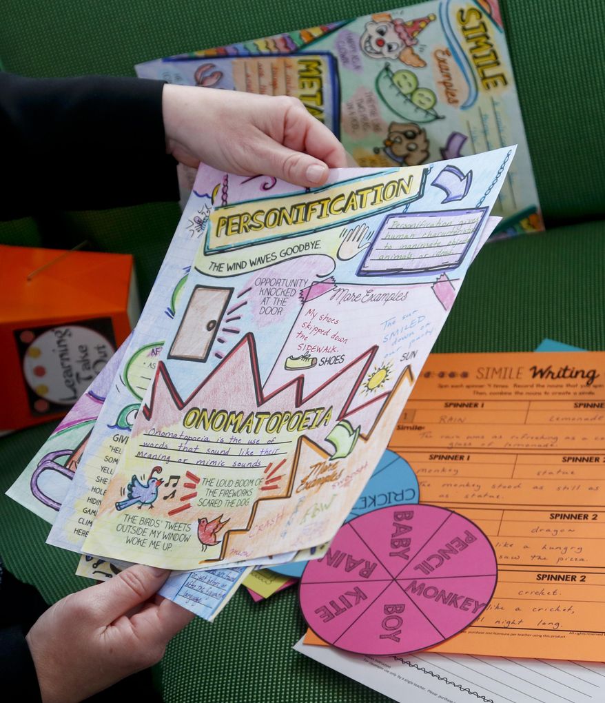 In this Monday April 3, 2017, photo, Mary Beth Nerone, a former middle-school teacher from Rochester, N.Y., shows materials from her online store in New York. After losing her job as a language arts teacher to budget cuts three years ago, Nerone began stocking the store with writing, poetry and other curricula exercises she created for other teachers to purchase. (AP Photo/Bebeto Matthews)