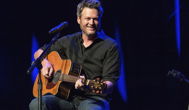 FILE - This June 7, 2016 file photo shows Blake Shelton performing at the 12th Annual Stars for Second Harvest Benefit at Ryman Auditorium in Nashville, Tenn. Lawyers for Shelton and In Touch magazine asked a federal judge in Los Angeles, Thursday, April 13, 2017, to dismiss the country star&#x27;s defamation lawsuit against the tabloid over a 2015 cover story that declared he was headed to rehab. No settlement details were included, but Shelton has denied the allegations in the story and won an early court ruling that kept the case alive.  (Photo by Amy Harris/Invision/AP, File)