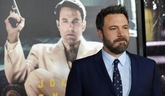 FILE - In this Monday, Jan. 9, 2017, file photo, Ben Affleck, the director, producer, writer and star of &amp;quot;Live by Night,&amp;quot; poses at the premiere of the film at the TCL Chinese Theatre in Los Angeles. Court records in Los Angeles show Jennifer Garner and Affleck each filed divorce paperwork on Thursday, April 13, 2017, citing irreconcilable differences for the end of their marriage. The actors announced their intention to divorce in June 2015, and filed virtually identical paperwork Thursday to have joint custody of their three children, who range in ages from 5 to 11. (Photo by Chris Pizzello/Invision/AP, File)