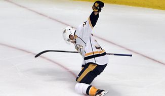 Nashville Predators right wing Viktor Arvidsson celebrates his goal against the Chicago Blackhawks during the first period in Game 1 of a first-round NHL hockey playoff series Thursday, April 13, 2017, in Chicago. (AP Photo/David Banks)