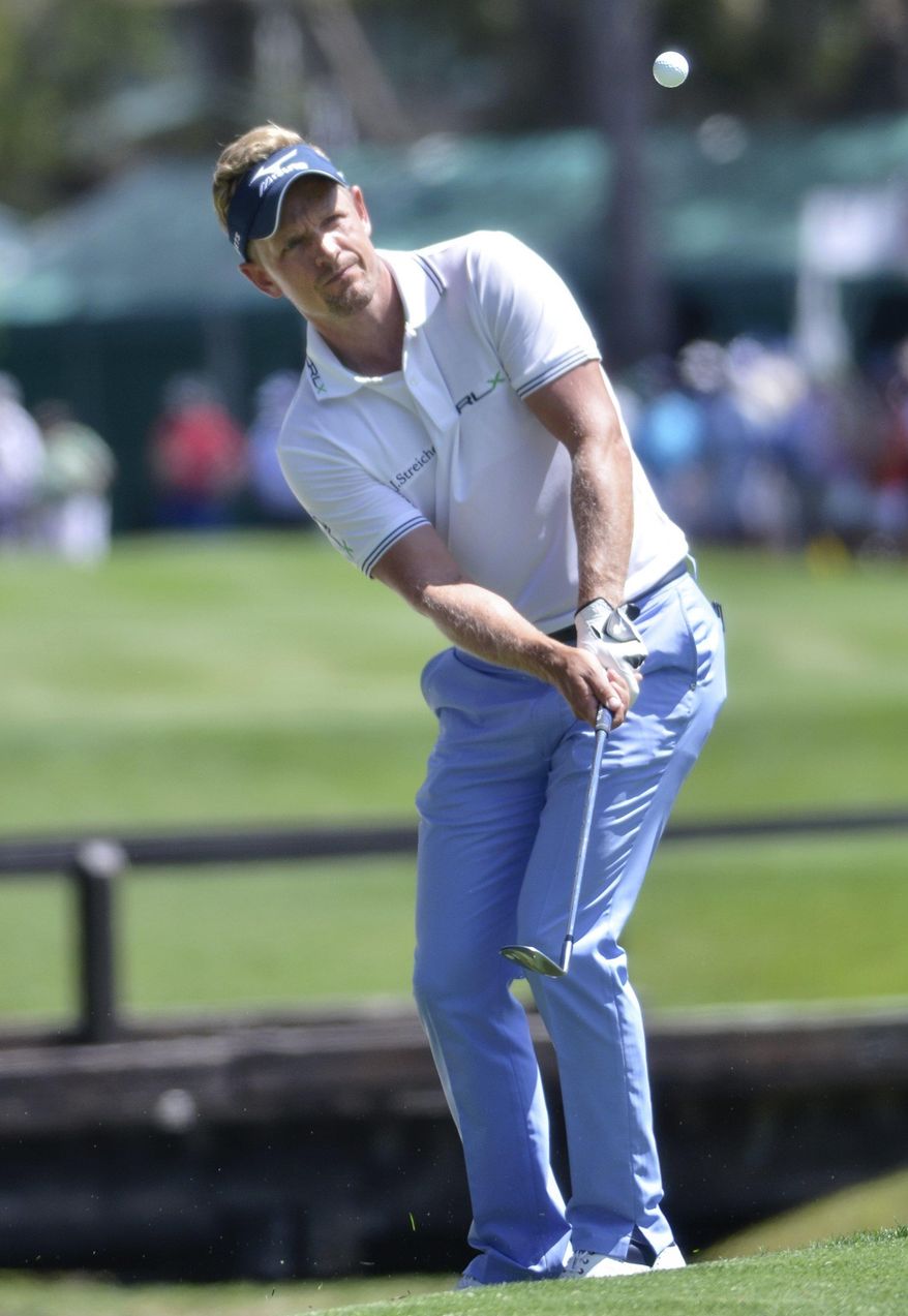 Luke Donald chips onto No. 7 during the first round of the RBC Heritage Presented by Boeing on Thursday, April 13, 2017 at Harbour Town Golf Links on Hilton Head Island. Donald took the morning lead at the tournament at 6-under-par. (Jay Karr /The Island Packet via AP)