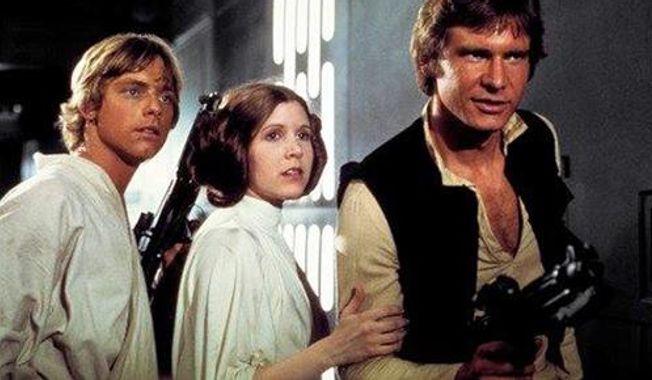 This photo provided by Twentieth Century Fox Home Entertainment shows, Mark Hamill, from left, as Luke Skywalker, Carrie Fisher as Princess Leia Organa, and Harrison Ford as Hans Solo in the original 1977 &amp;quot;Star Wars: Episode IV - A New Hope.&amp;quot; The  four-day Star Wars Celebration kicked off Thursday, April 14, 2017 in Orlando, Fla., marking the 40-year anniversary of Lucas’ space saga. (Twentieth Century Fox Home Entertainment via AP) ** FILE **