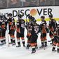 Anaheim Ducks players celebrate their team&#39;s 3-2 win against the Calgary Flames in Game 1 of a first-round NHL hockey Stanley Cup playoff series Thursday, April 13, 2017, in Anaheim, Calif. (AP Photo/Jae C. Hong)