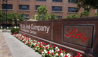 FILE - This Thursday, June 30, 2011, file photo shows a sign in front of the Eli Lilly and Company corporate headquarters in Indianapolis. On Friday, April 14, 2017, Eli Lilly said U.S. regulators have rejected its much-anticipated pill for the immune disorder rheumatoid arthritis, the drugmaker&#x27;s second drug development setback since November 2016. (AP Photo/Darron Cummings, File)