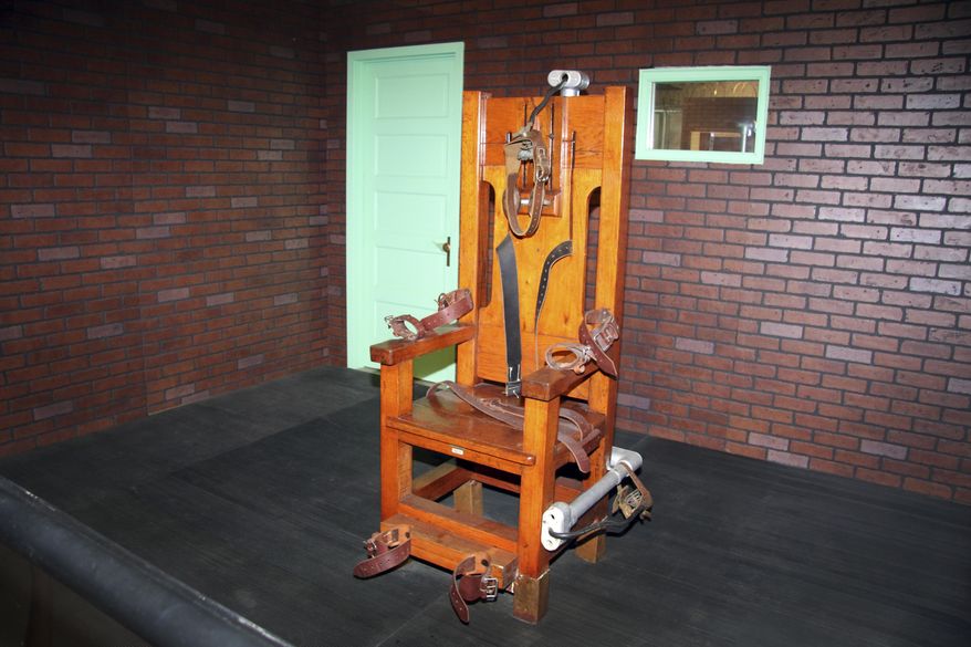 In this April 5, 2017 photo, an exhibit at the Texas Prison Museum shows the old Texas electric chair used to execute hundred of Texas inmates in Huntsville, Texas, from 1924 through 1964. In Texas, records show multiple executions 28 times starting in 1924 when the state took over execution duties from counties and electrocution became the capital punishment method. For its inauguration on Feb. 8, 1924, the new electric chair was used five times. Arkansas is set to use lethal injection for a scheduled seven executions, two of which are planned for Monday, April 17. (AP Photo/Michael Graczyk)