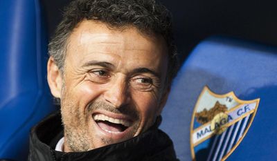 FILE - In this file photo dated Saturday April 8, 2017, FC Barcelona&#x27;s coach Luis Enrique waits for the start of a Spanish La Liga soccer match between Malaga and Barcelona in Malaga, Spain. With a Champions League title, two Liga crowns, and two Copa del Rey trophies, Luis Enrique is very successful, but as from Friday April 14, 2017, the next nine days will determine Barcelona’s 2017 season, and whether he will be considered among the Spanish club&#x27;s finest ever coaches. (AP Photo/Daniel Tejedor, FILE)