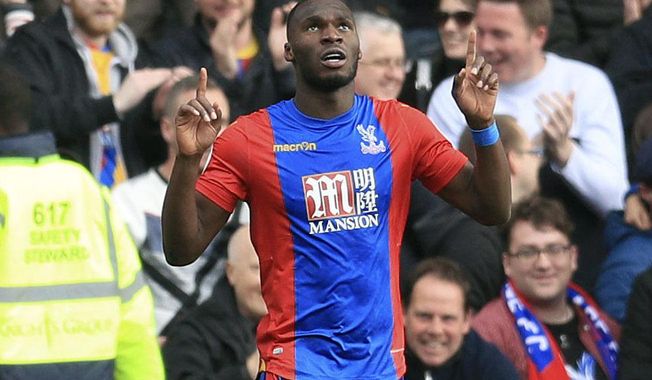 Crystal Palace&#x27;s Christian Benteke celebrates scoring his side&#x27;s second goal of the game during their English Premier League soccer match against Leicester City at Selhurst Park, London, Saturday, April 15, 2017. (Adam Davy/PA via AP)