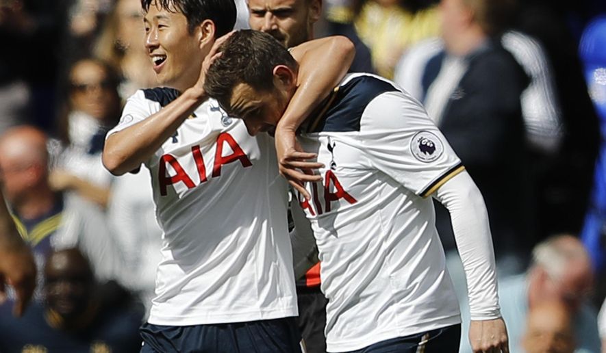 Tottenham Hotspur&#x27;s Son Heung-min, left, and Tottenham Hotspur&#x27;s Vincent Janssen celebrate after scoring during the Premier League soccer match between Tottenham Hotspur and Bournemouth at White Hart Lane stadium in London, Saturday, April 15, 2017.(AP Photo/Frank Augstein)