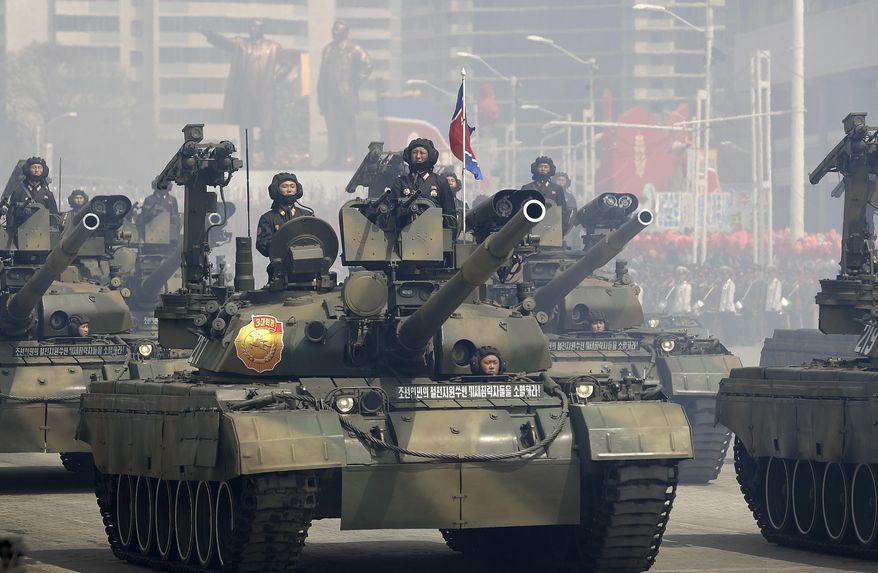 Soldiers in tanks are paraded on the Kim Il Sung Square during a military parade on Saturday, April 15, 2017, in Pyongyang, North Korea to celebrate the 105th birth anniversary of Kim Il Sung, the country's late founder and grandfather of current ruler Kim Jong Un. (AP Photo/Wong Maye-E)