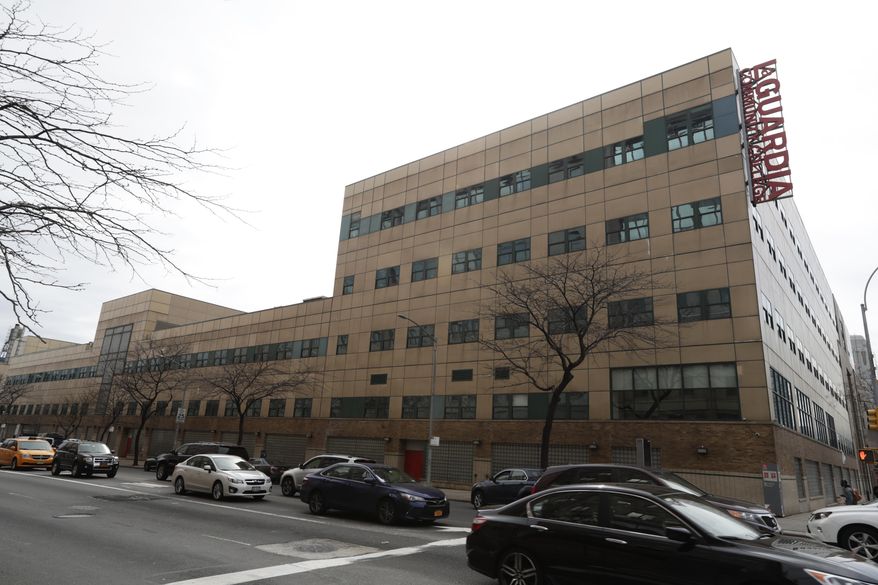 In this Saturday, April 15, 2017, photo, cars pass LaGuardia Community College in New York, where new legislation would allow some students to attend tuition-free. Some higher education experts question whether New York’s first-in-the nation free college tuition plan should be a model for other states. The plan would cover tuition at public colleges for students whose families earn $125,000 or less. But there are questions whether more should be done for the poorest students, and to pay for the many college costs beyond tuition. (AP Photo/Frank Franklin II)