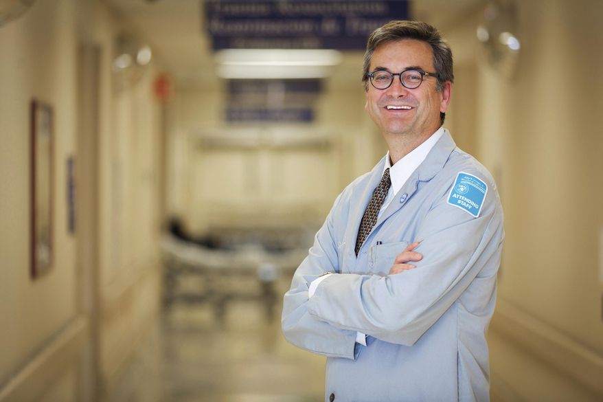 This undated photo provided by Cook County Health & Hospitals System shows Dr. Jay Shannon. Cook County Health & Hospitals System, which handles more than 1 million patient visits in the Chicago area every year, has seen a significant financial boost from the Affordable Care Act. About 70 percent of the system’s patients were uninsured before the Affordable Care Act expanded coverage in 2014. Now, nearly the same percentage has coverage, and the system relies less on local tax dollars for support. The law’s future is unclear as Republicans in Congress consider another push to replace it after failing in March 2017. (Cook County Health & Hospitals System via AP)