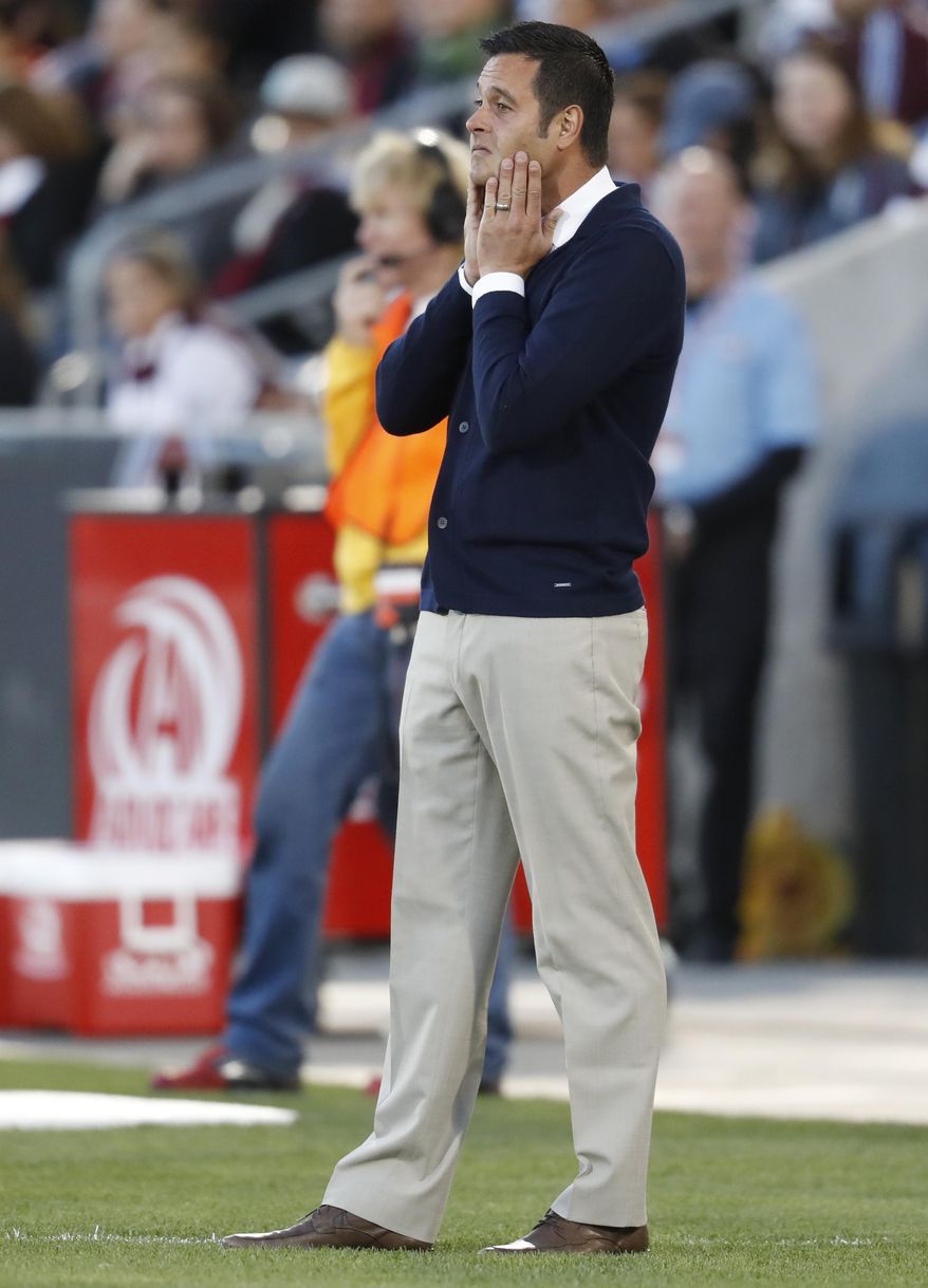 Real Salt Lake head coach Mike Petke looks on against the Colorado Rapids in the first half of an MLS soccer match, Saturday, April 15, 2017, in Commerce City, Colo. (AP Photo/David Zalubowski)