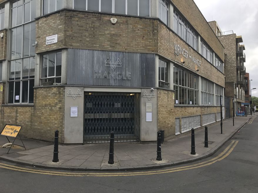 General view of the Mangle nightclub in Dalston, east London on Monday April 17, 2017. London police are investigating an acid attack at a London club that led to a mass evacuation with 12 people injured. Police said Monday April 17, 2017 that 12 people were treated at hospitals for burns. None of the injuries were said to be life-threatening. (Jack Hard/PA via AP)