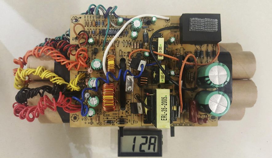 This April 2017 photo provided by U.S. Customs and Border Protection shows a mock improvised explosive device that led to delays at Toronto's Pearson International Airport when it was found in a passenger's luggage. American Joseph Galaska was charged with mischief. (U.S. Customs and Border Protection Patrol via AP)