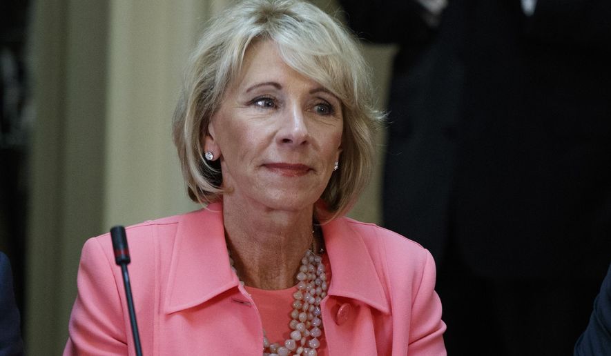 Education Secretary Betsy DeVos is seen in the State Department Library of the Eisenhower Executive Office Building on the White House complex in Washington on April 11, 2017. (Associated Press) **FILE**