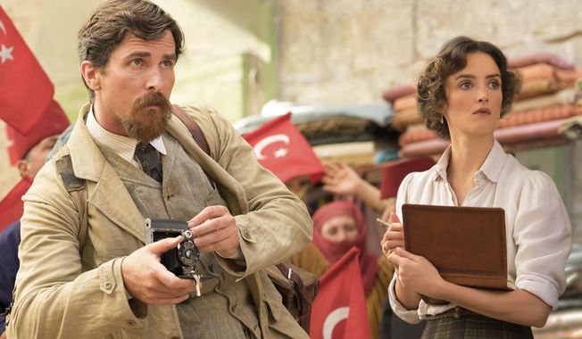 This image released by Open Road Films shows Charlotte Le Bon, right, and Christian Bale in a scene from &amp;quot;The Promise.&amp;quot; (Jose Haro/Open Road Films via AP)