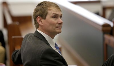 Patrick Jones waits during proceedings at the Orange County Courthouse in Hillsborough, N.C., Monday, April 17, 2017. Jones, 43, was charged in 2013 with athlete-agent inducement for providing $725 to former North Carolina football player Robert Quinn. An indictment stated Jones had provided the money through Quinn's former girlfriend to entice Quinn to sign with agent Terry Watson. (AP Photo/Gerry Broome)