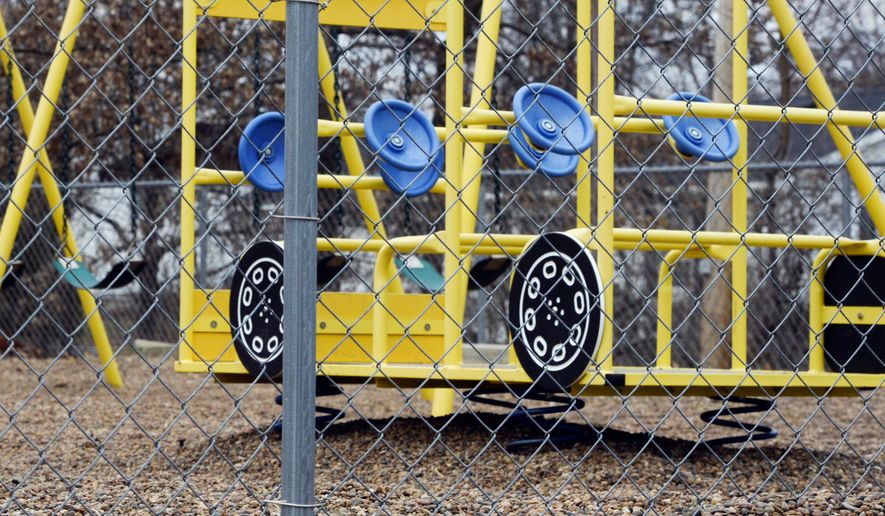 In this photo taken Jan. 26, 2016, the empty playground at Trinity Lutheran Church in Columbia, Mo. Justice Neil Gorsuch's first week hearing Supreme Court arguments features a case that's giving school choice advocates hope for an easier use of public money for private, religious schools in dozens of states. The long-delayed argument Wednesday, April 19, 2017, deals with whether Missouri should pay for a soft surface at the church playground. (Annaliese Nurnberg/Missourian via AP)