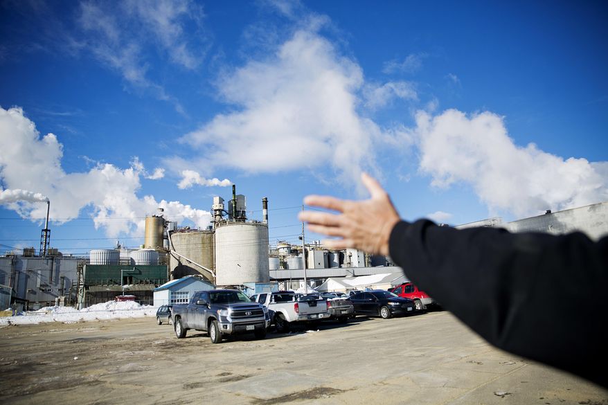 ADVANCE FOR USE WEDNESDAY, APRIL 19, 2017 AND THEREAFTER-David Lovewell, 59, compares the emptiness of the parking lot at the paper mill compared to when he worked there a few years earlier in Jay, Maine, Friday, March 17, 2017. "Look at this parking lot. It's just amazing. At this time of day this parking lot was absolutely full: that's people, that's jobs, that's families," said Lovewell who voted for Trump. (AP Photo/David Goldman)