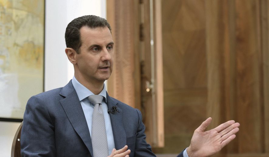 In this Feb. 10, 2017, file photo released by the Syrian official news agency SANA, Syrian President Bashar Assad speaks during an interview with Yahoo News in Damascus, Syria. (SANA via AP, File)