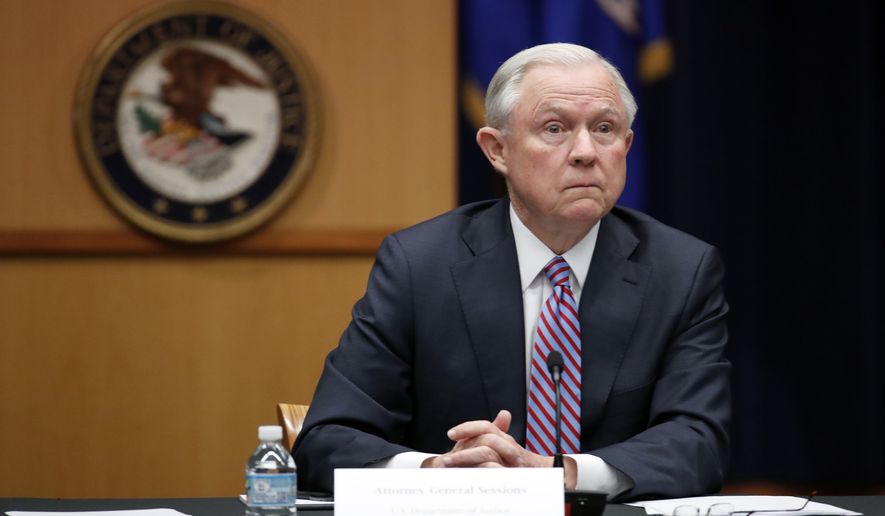 Attorney General Jeff Sessions listens to reporter&#39;s question before a meeting of the Attorney General&#39;s Organized Crime Council and Organized Crime Drug Enforcement Task Forces (OCDETF) Executive Committee to discuss implementation of the President&#39;s Executive Order 13773, Tuesday, April 18, 2017, at the Justice Department in Washington. (AP Photo/Alex Brandon)