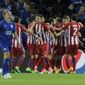 Atletico Madrid&#x27;s Saul Niguez, obscured, celebrates scoring his side&#x27;s first goal during the Champions League quarterfinal second leg soccer match between Leicester City and Atletico Madrid at King Power Stadium, Leicester, England, Tuesday, April 18, 2017. (AP Photo/Rui Vieira)