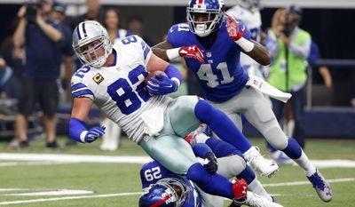 FILE - In this Sept. 11, 2016, file photo, Dallas Cowboys tight end Jason Witten (82) is tackled after a catch by New York Giants free safety Nat Berhe (29) and cornerback Dominique Rodgers-Cromartie (41) during an NFL football game in Arlington, Texas. Dallas tried unsuccessfully to draft an heir to tight end Jason Witten, whiffing on second-round pick Gavin Escobar. Witten is signed through 2021 but realistically has only a couple seasons left. (AP Photo/Michael Ainsworth, File)